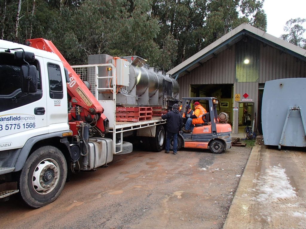 OSCA composter unloaded at ski resort location for organic waste management and composting operations